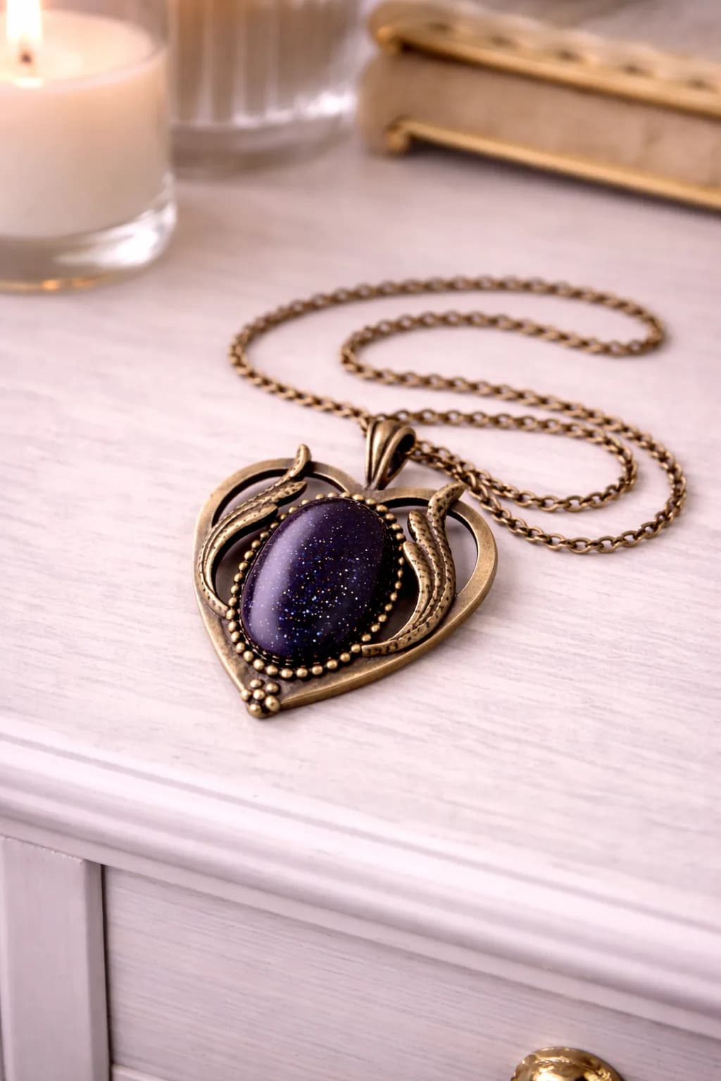 Collier Cœur en Bronze & Goldstone Blue – Éclat Céleste et Confiance